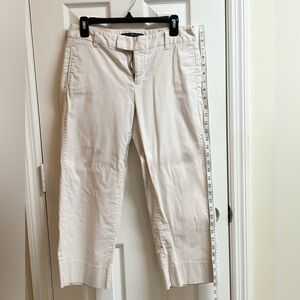 Gap capri pants, white with tan pinstripes. Size 6.